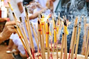 close up photo of lighted incense sticks